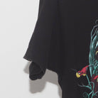 Close-up of the Left sleeve on the Vintage Y2K Disney "Villains Skull" T-Shirt - XS