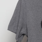 Close-up of the Left sleeve on the Vintage Y2K Divider Records "Record Logo" T-Shirt - S