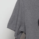 Close-up of the Left sleeve on the Vintage Y2K Divider Records "Record Logo" T-Shirt - S