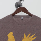 Close-up of the collar and tag on the Vintage Y2K Dole Plantation "Pineapple Rooster" T-Shirt - M
