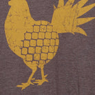 Close-up of the main graphic on the Vintage Y2K Dole Plantation "Pineapple Rooster" T-Shirt - M
