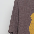 Close-up of the Left sleeve on the Vintage Y2K Dole Plantation "Pineapple Rooster" T-Shirt - M