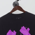 Close-up of the collar and tag on the Vintage Y2K Extrax "Graffiti Smiley" T-Shirt - M