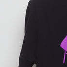 Close-up of the Left sleeve on the Vintage Y2K Extrax "Graffiti Smiley" T-Shirt - M