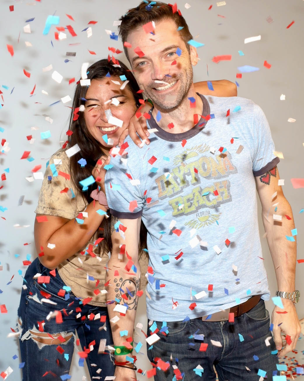 The Faded Vibes founders wearing authentic vintage t-shirts, including a classic Daytona Beach ringer tee.