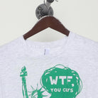 Close-up of the collar and tag on the Vintage Y2K Statue of Liberty "WTF, You Guys" T-Shirt - L