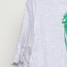 Close-up of the Left sleeve on the Vintage Y2K Statue of Liberty "WTF, You Guys" T-Shirt - L