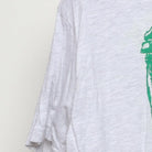 Close-up of the Left sleeve on the Vintage Y2K Statue of Liberty "WTF, You Guys" T-Shirt - L