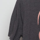 Close-up of the Left sleeve on the Vintage 2010s Graphic "Good Vibes Cat" T-Shirt - L