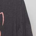 Close-up of the Right sleeve on the Vintage 2010s Graphic "Good Vibes Cat" T-Shirt - L