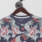 Close-up of the collar and tag on the Vintage Y2K Threadbare "All-Over Floral Print" T-Shirt - S