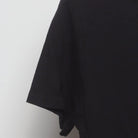 Close-up of the Left sleeve on the Vintage Y2K Harley-Davidson "#1 USA Flag" T-Shirt - S