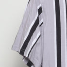 Close-up of the Left sleeve on the Vintage Y2K Hollister "Embroidered Script Logo Striped" T-Shirt - M