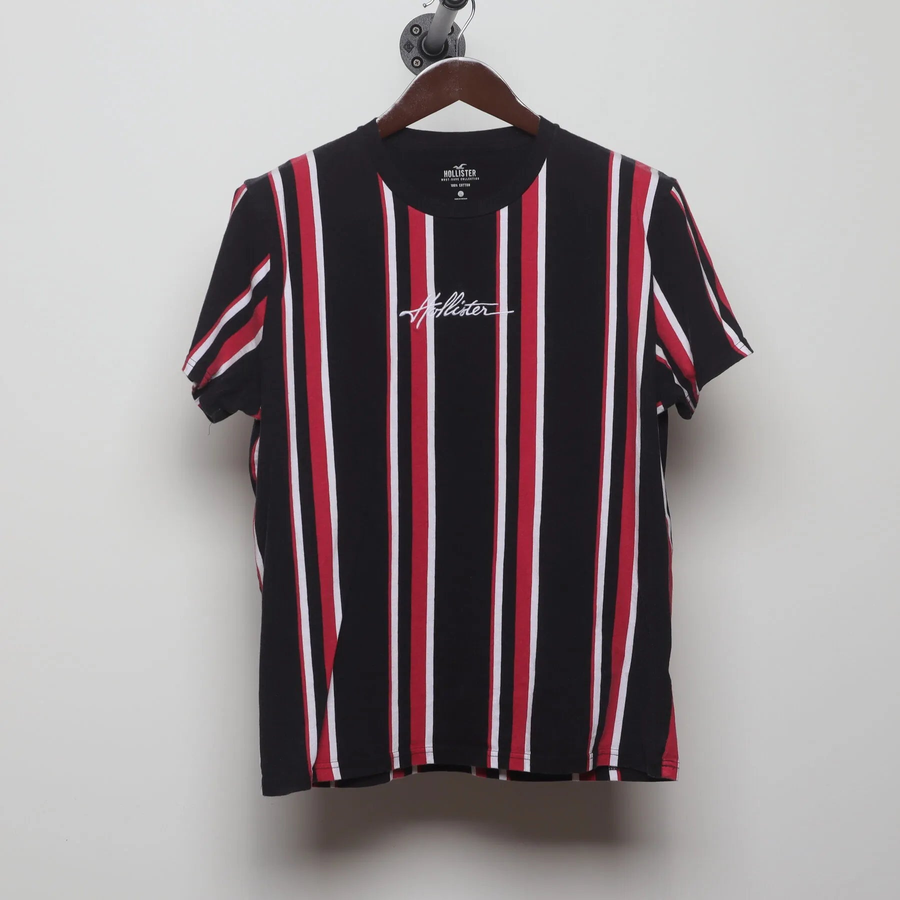 Front view of Vintage Y2K Hollister "Vertical Stripe Logo" T-Shirt - M