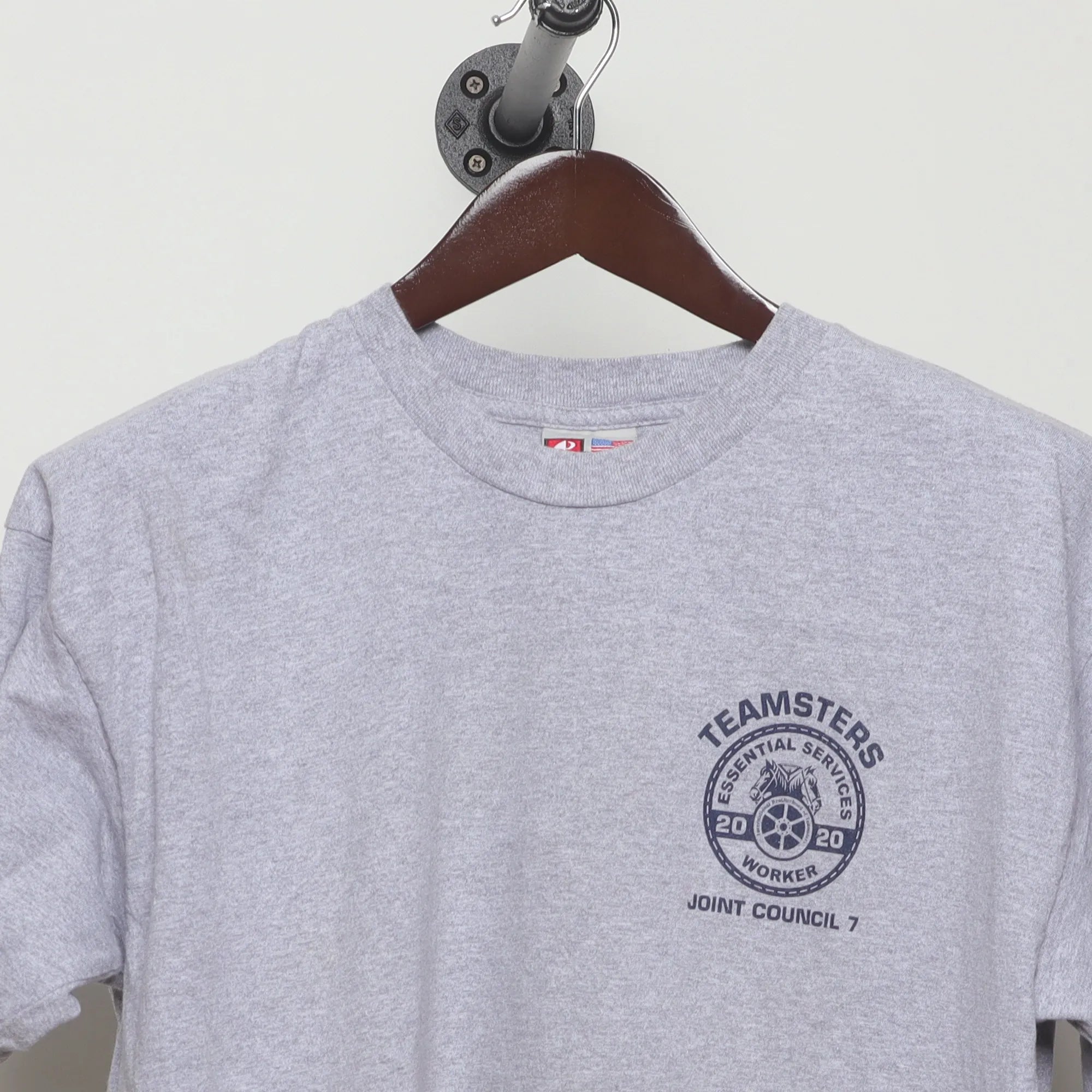 Close-up of the collar and tag on the Modern 2020s Teamsters Essential Worker Tee L