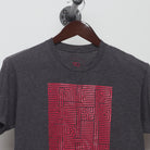 Close-up of the collar and tag on the Modern Beyond Reality Maze Graphic T-Shirt M