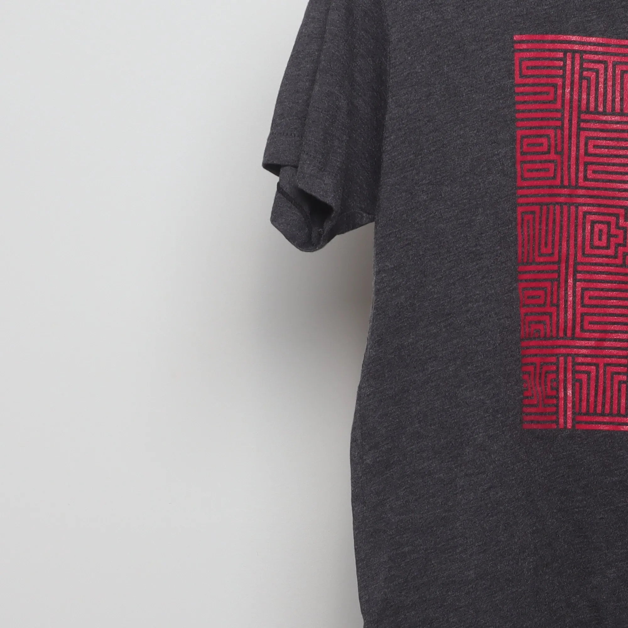 Close-up of the sleeve on the Modern Beyond Reality Maze Graphic T-Shirt M