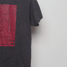 Close-up of the sleeve on the Modern Beyond Reality Maze Graphic T-Shirt M