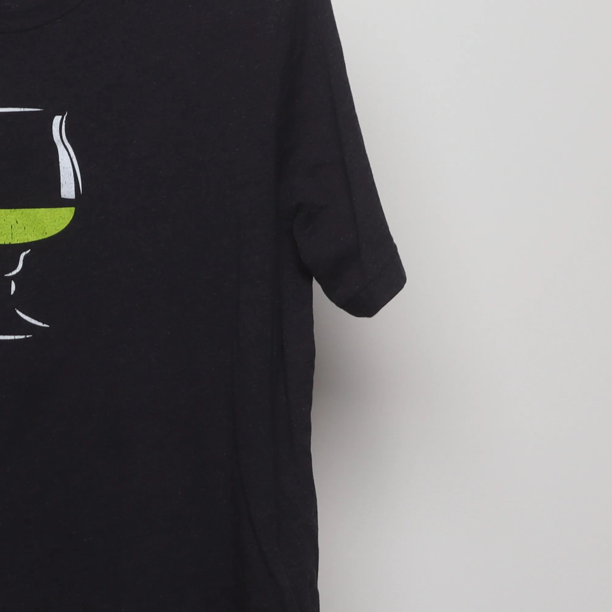 Close-up of the sleeve on the Modern Chartreuse Liqueur Graphic T-Shirt L