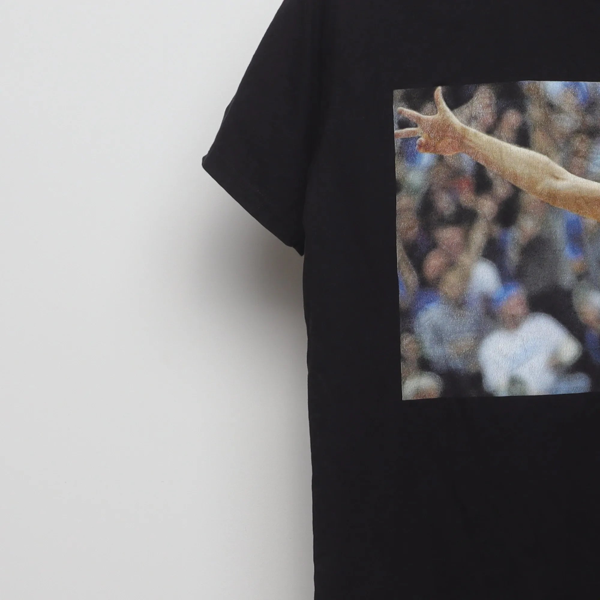 Close-up of the sleeve on the Modern Dirk Nowitzki Shoot First Mafia T-Shirt M
