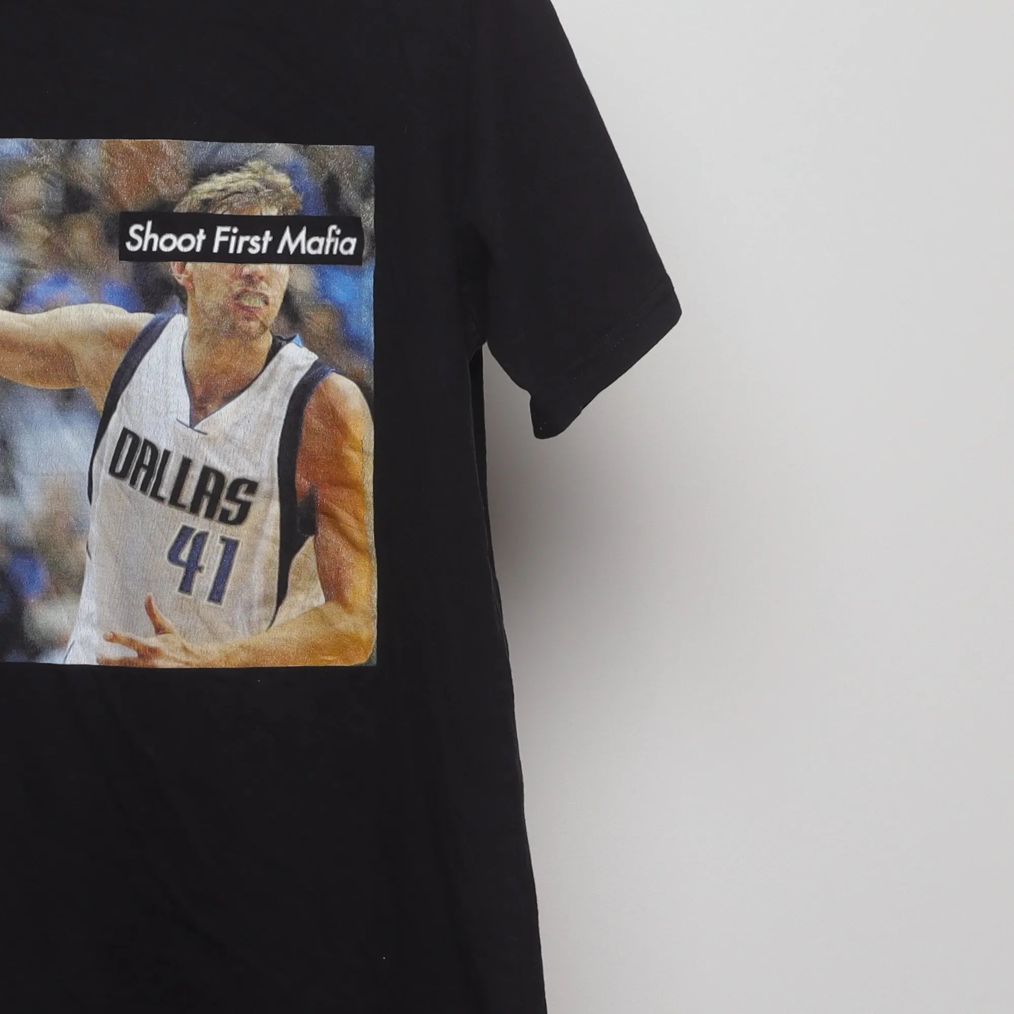 Close-up of the sleeve on the Modern Dirk Nowitzki Shoot First Mafia T-Shirt M