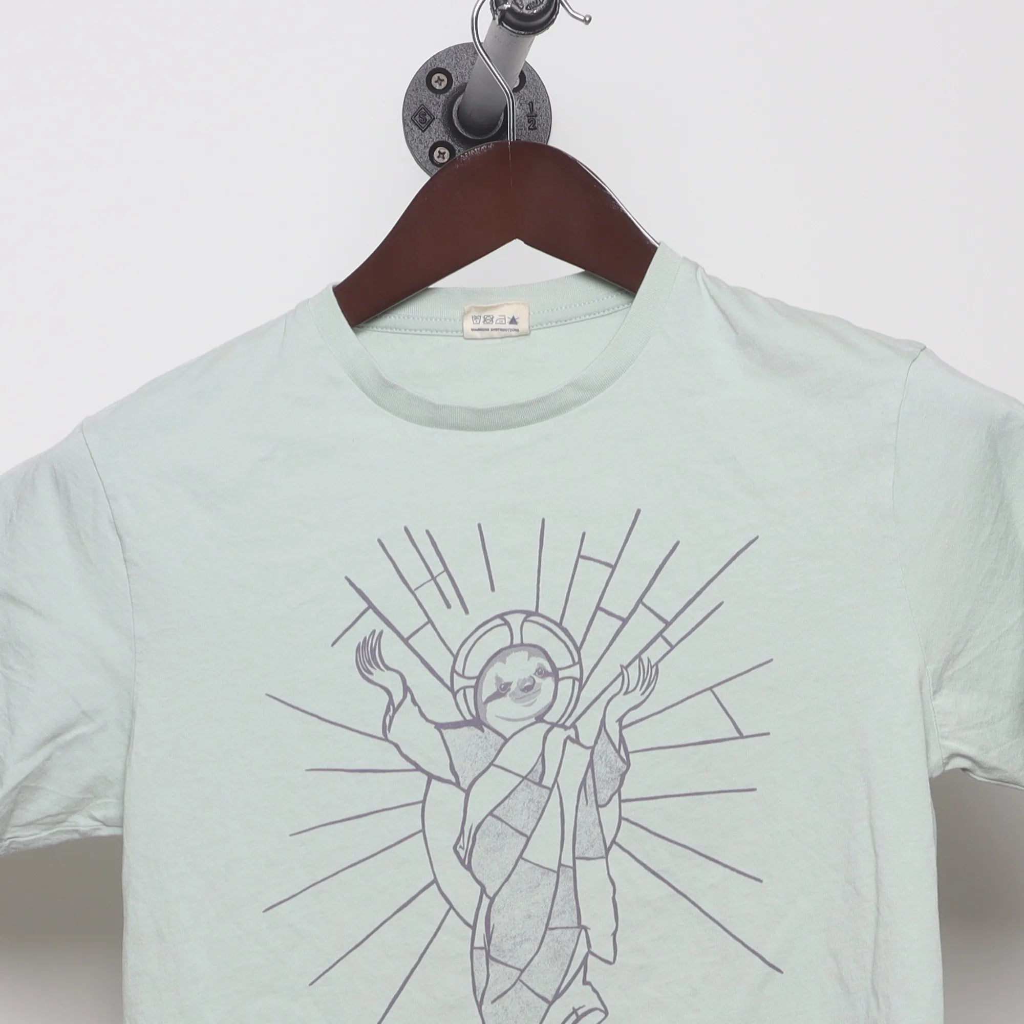Close-up of the collar and tag on the Modern Sloth Saint Parody Graphic T-Shirt XS