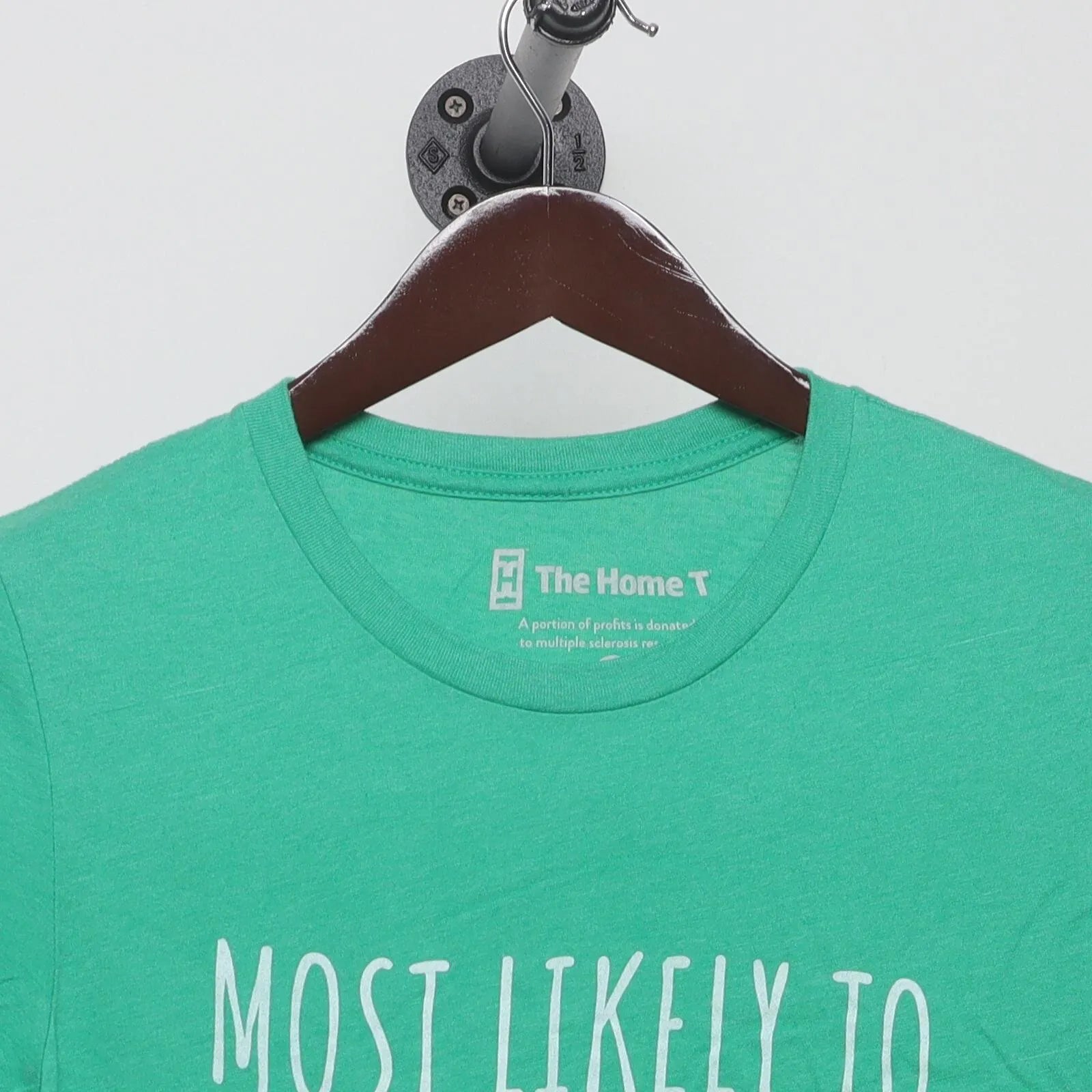 Close-up of the collar and tag on the Modern The Home T "Most Likely To Get Socks" T-Shirt - S