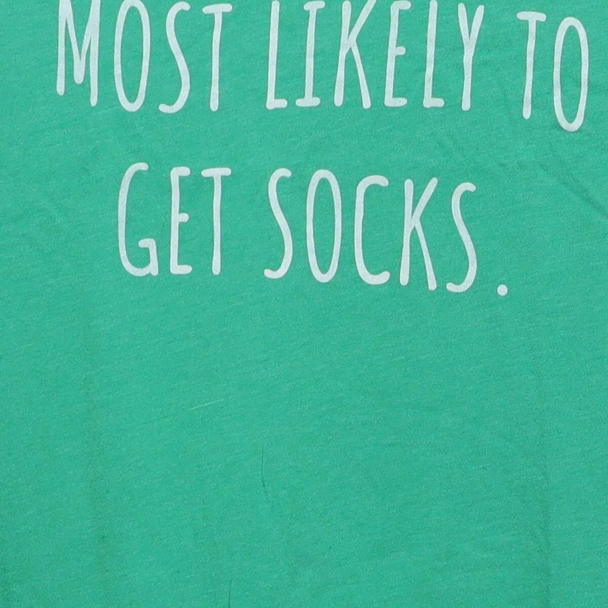 Close-up of the main graphic on the Modern The Home T "Most Likely To Get Socks" T-Shirt - S