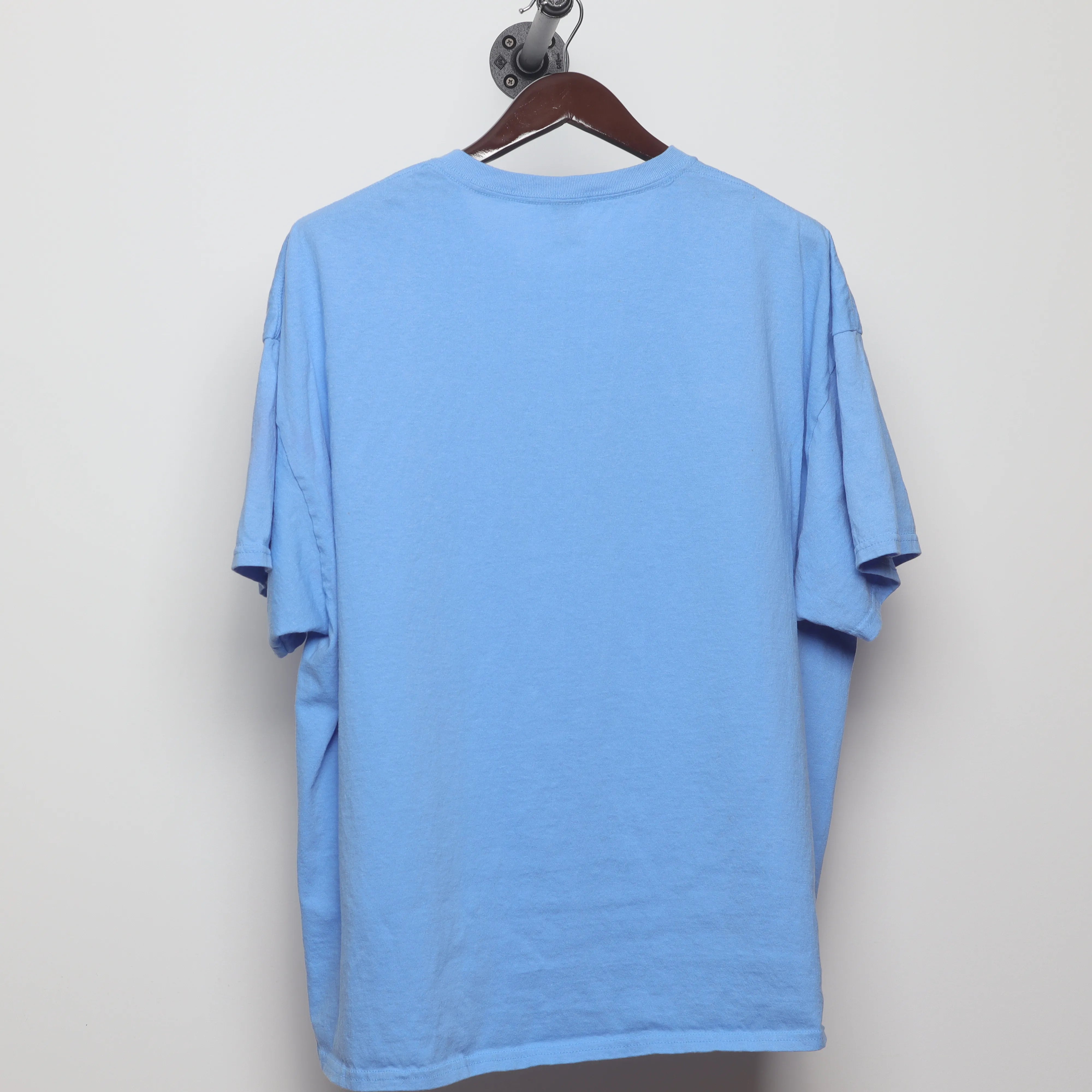 Back view of Modern Y2K Style Colton Cartoon Graphic T-Shirt XL