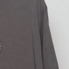 Close-up of the Right sleeve on the Vintage Y2K Jane Austen "More Pride Less Prejudice" T-Shirt - XL