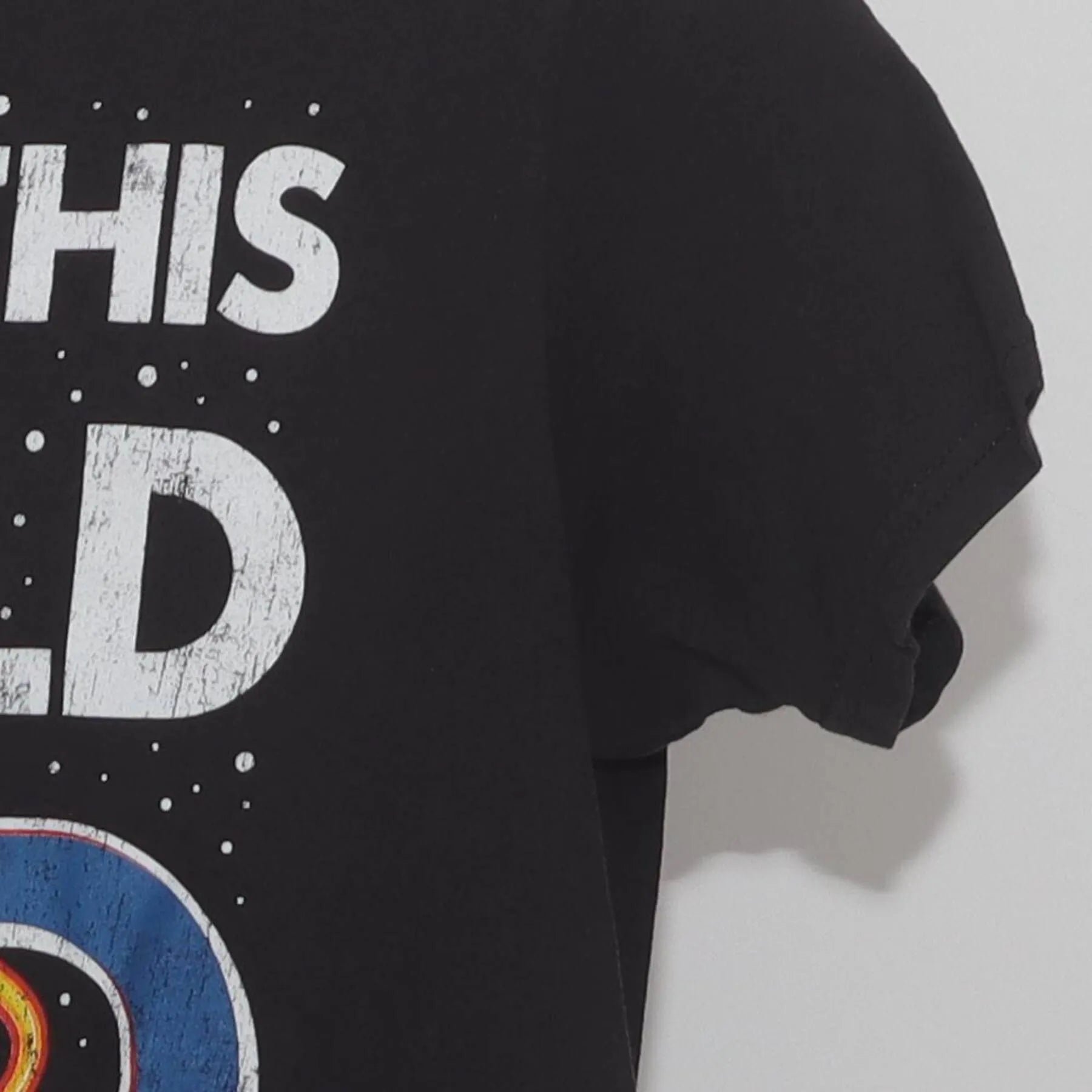 Close-up of the Right sleeve on the Vintage Y2K NASA "Out Of This World Dad" T-Shirt - S