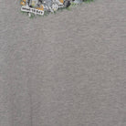 Close-up of the main graphic on the Vintage Y2K Nike "Photo Collage Swoosh" T-Shirt - M