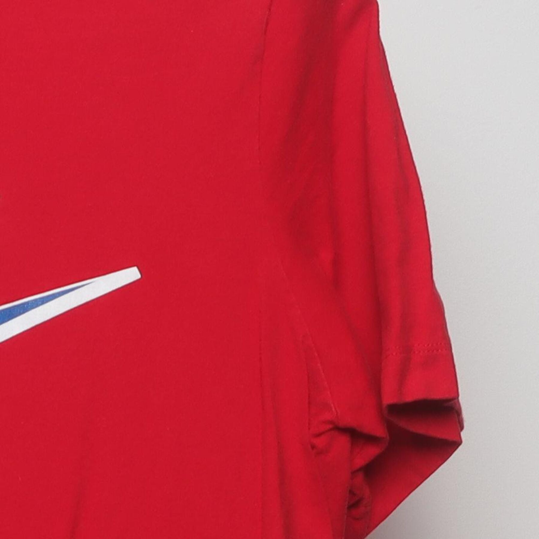 Close-up of the Right sleeve on the Vintage 2010s Nike "Futura Script Logo" T-Shirt - M