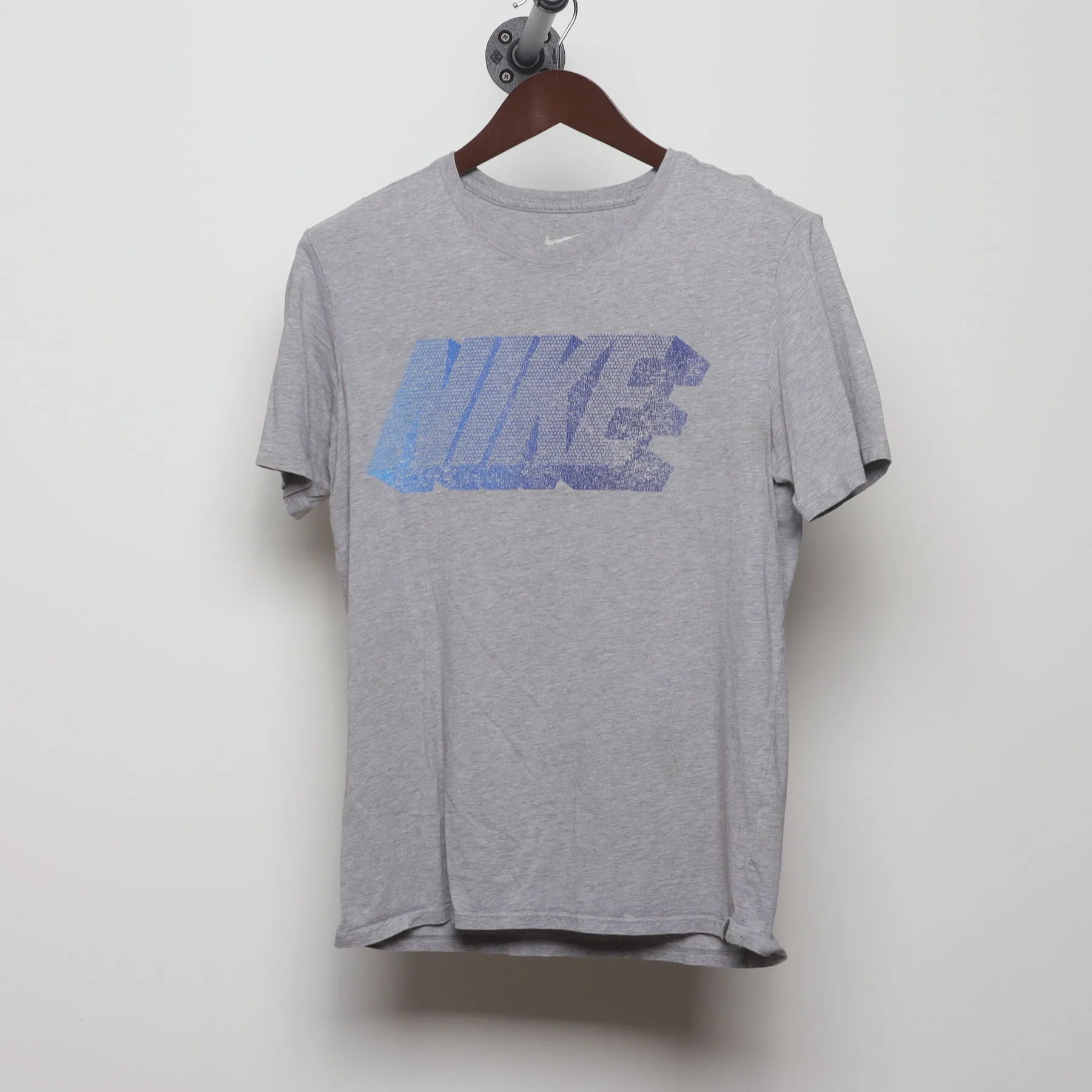 Front view of Vintage Y2K Nike "Gradient Block Logo" T-Shirt - S