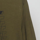 Close-up of the Right sleeve on the Vintage 2010s Nike "Just Do It" Graphic T-Shirt - L