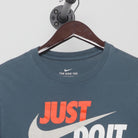 Close-up of the collar and tag on the Vintage 2010s Nike "Just Do It" T-Shirt - S