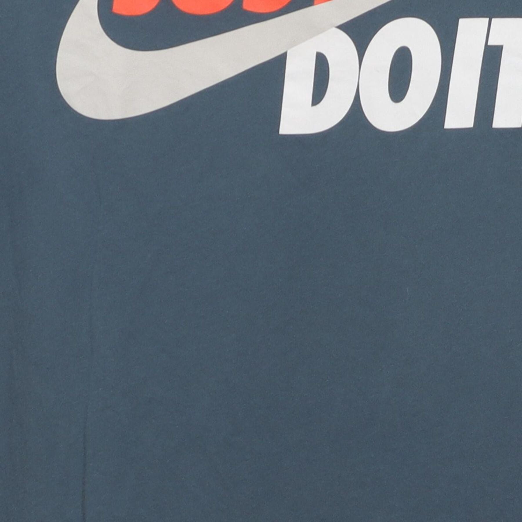 Close-up of the main graphic on the Vintage 2010s Nike "Just Do It" T-Shirt - S