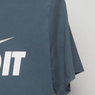 Close-up of the Right sleeve on the Vintage 2010s Nike "Just Do It" T-Shirt - S