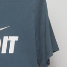 Close-up of the Right sleeve on the Vintage 2010s Nike "Just Do It" T-Shirt - S