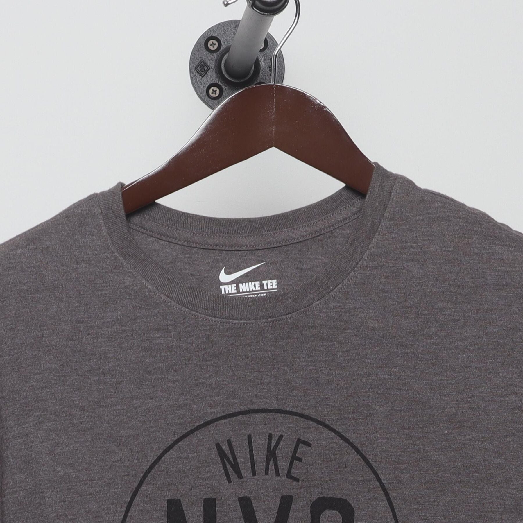 Close-up of the collar and tag on the Vintage Y2K Nike "NYC Est. 1972" T-Shirt - L
