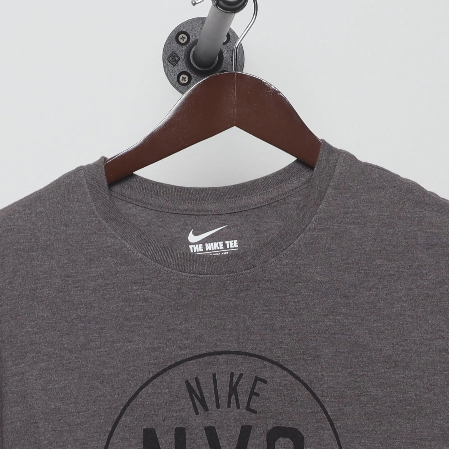 Close-up of the collar and tag on the Vintage Y2K Nike "NYC Est. 1972" T-Shirt - L