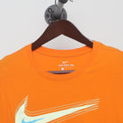 Close-up of the collar and tag on the Vintage 2010s Nike "Motion Swoosh" T-Shirt - M