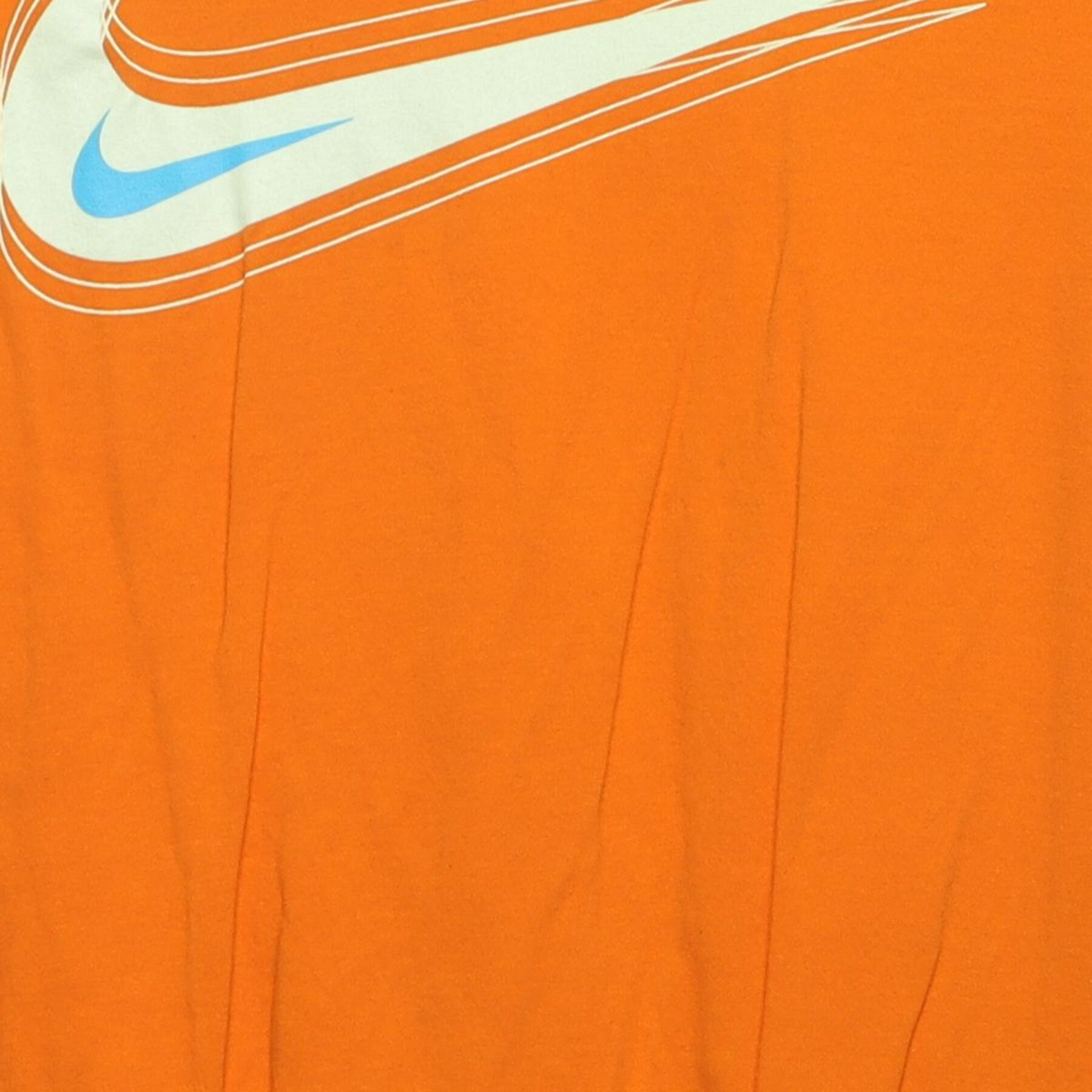 Close-up of the main graphic on the Vintage 2010s Nike "Motion Swoosh" T-Shirt - M