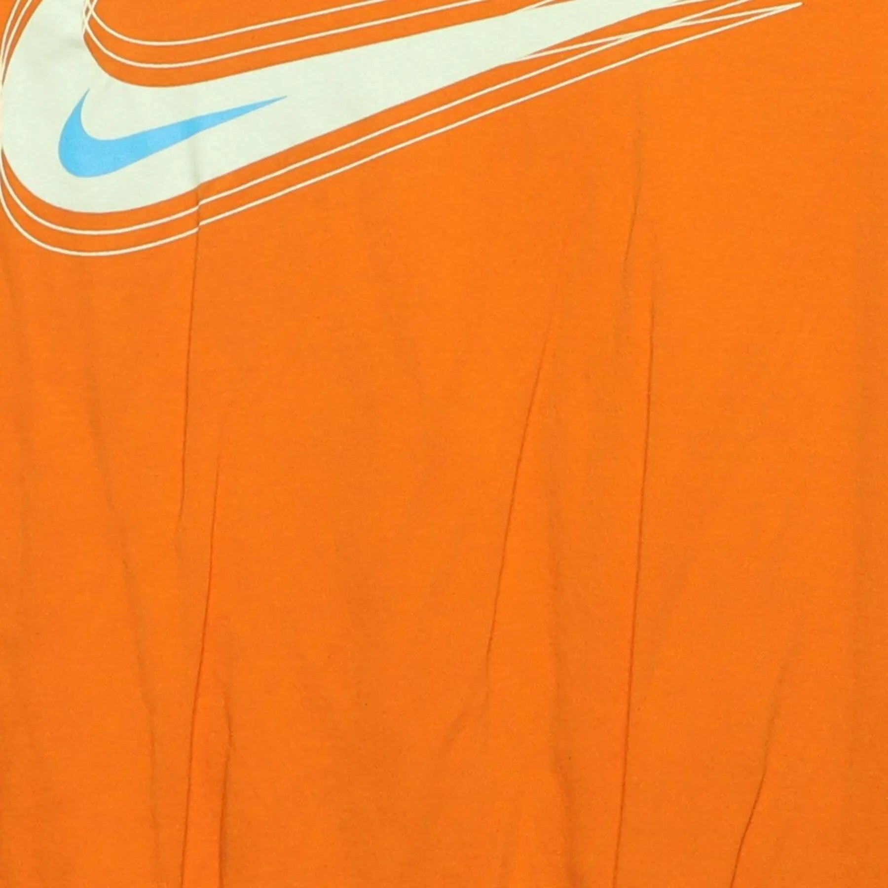 Close-up of the main graphic on the Vintage 2010s Nike "Motion Swoosh" T-Shirt - M