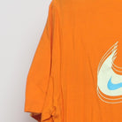 Close-up of the Left sleeve on the Vintage 2010s Nike "Motion Swoosh" T-Shirt - M