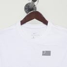 Close-up of the collar and tag on the Vintage 2010s Nike "US Soccer One Nation One Team" T-Shirt - M