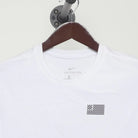 Close-up of the collar and tag on the Vintage 2010s Nike "US Soccer One Nation One Team" T-Shirt - M