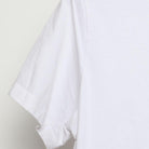 Close-up of the Left sleeve on the Vintage 2010s Nike "US Soccer One Nation One Team" T-Shirt - M