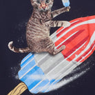 Close-up of the main graphic on the Vintage Y2K Celebrate! Patriotic "Cat Riding Rocket Pop" T-Shirt - M