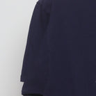 Close-up of the Left sleeve on the Vintage Y2K Celebrate! Patriotic "Cat Riding Rocket Pop" T-Shirt - M